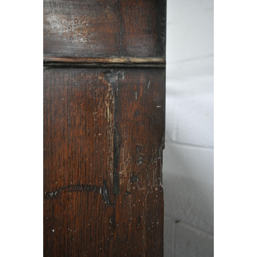 1263 - A GEORGIAN AND LATER OAK CORNER CUPBOARD, with a single astragal glazed door, above a single drawer ... 