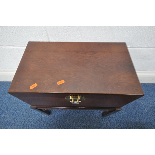 1265 - A REPRODUCTION ORIENTAL STYLE HARDWOOD BOX ON STAND, with twin brass handles and locking pin, width ... 