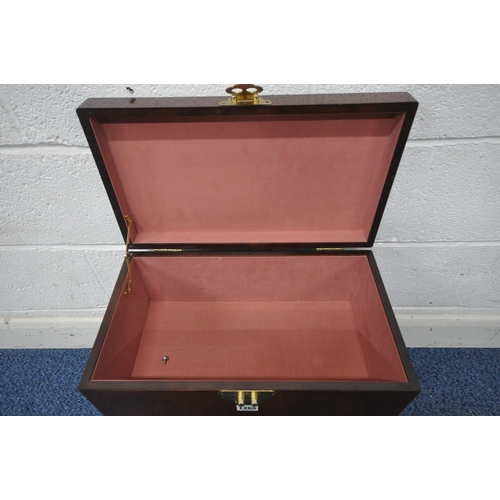 1265 - A REPRODUCTION ORIENTAL STYLE HARDWOOD BOX ON STAND, with twin brass handles and locking pin, width ... 