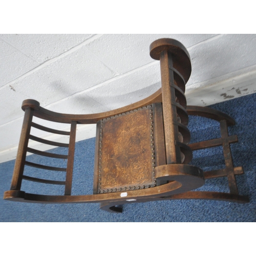 1271 - AN EARLY 20TH CENTURY OAK SAVONAROLA STOOL, with slatted armrests, leather seat, raised on an X fram... 