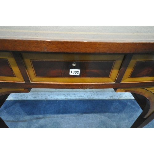 1303 - A REPRODUCTION MAHOGANY BOW FRONT SIDEBOARD, fitted with two cupboard doors, three drawers, raised o... 