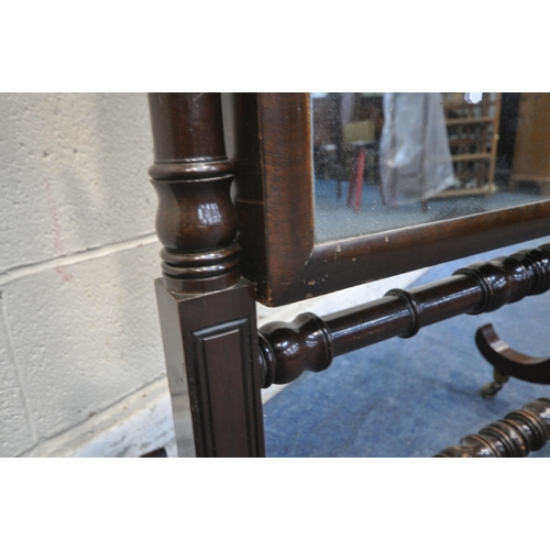 1305 - A GEORGIAN MAHOGANY CHEVAL MIRROR, with twin finials, turned supports, raised on shaped legs and bra... 