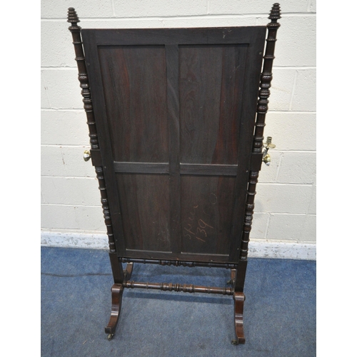 1305 - A GEORGIAN MAHOGANY CHEVAL MIRROR, with twin finials, turned supports, raised on shaped legs and bra... 