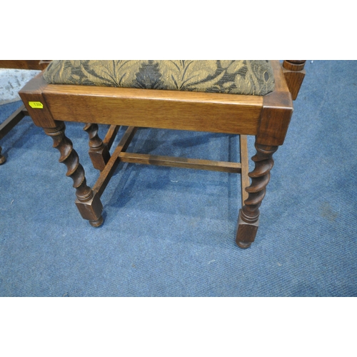 1306 - A SET OF SIX EARLY 20TH CENTURY OAK CHAIRS, including two carvers, with twin finials, carved details... 