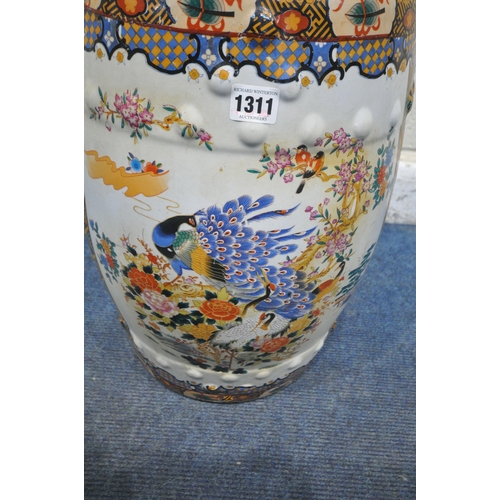 1311 - AN CHINESE BARREL SHAPED CERAMIC GLAZED STOOL, depicting birds, trees, flowers, and various geometri... 