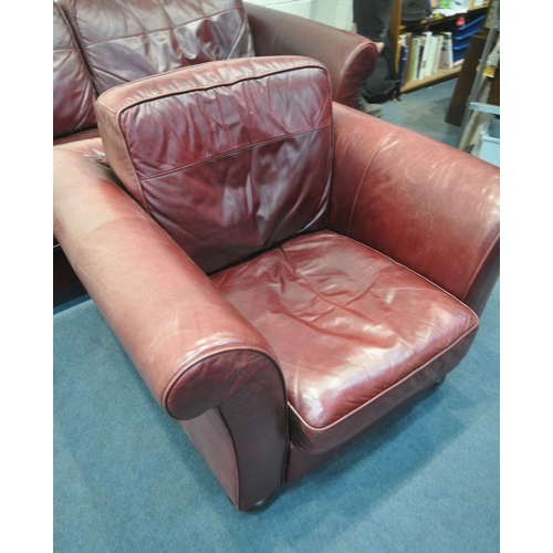 1322 - A CONTEMPO OXBLOOD LEATHER TWO PIECE LOUNGE SUITE, comprising a large two seater sofa, length 230cm ... 