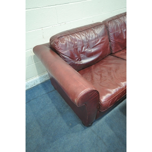 1322 - A CONTEMPO OXBLOOD LEATHER TWO PIECE LOUNGE SUITE, comprising a large two seater sofa, length 230cm ... 