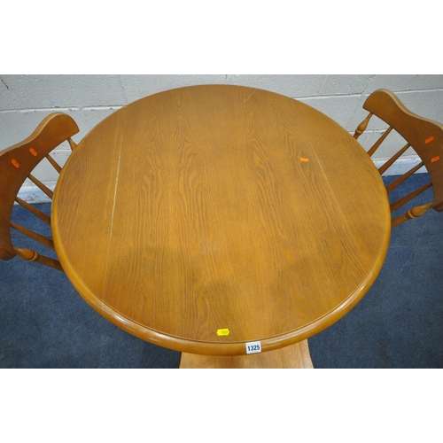 1325 - A LATE 20TH CENTURY DROP LEAF, raised on turned legs, diameter 102cm x closed width 68cm x height 75... 