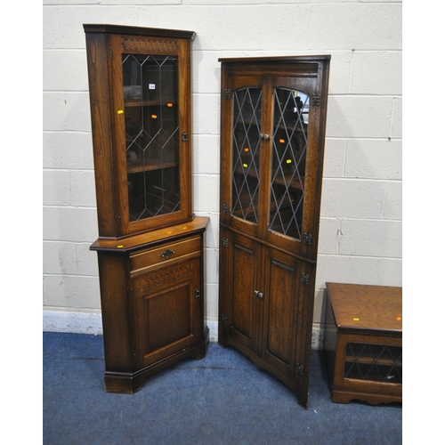 1334 - TWO OAK CORNER CUPBOARDS, the larger one splits in two for ease of transport, width 73cm x depth 50c... 