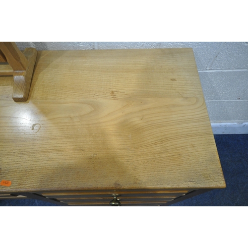 1342 - A GOOD QUALITY SOLID OAK DRESSING TABLE, fitted with nine assorted drawers, width 152cm x depth 49cm... 