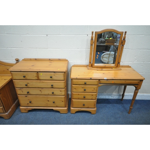 1350 - A MODERN PINE FIVE PIECE BEDROOM SUITE, comprising a dressing table, with five assorted drawers, wid... 