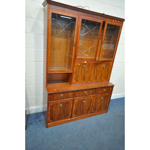 1353 - BERESFORD AND HICKS OF ENGLAND, A LATE 20TH CENTURY YEW WOOD CABINET, with three glazed doors, a fal... 