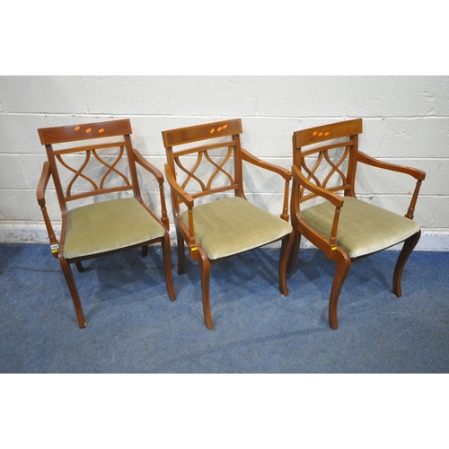 1354 - A SET OF THREE YEW WOOD CARVER CHAIRS, with green upholstery (condition report: marks, scuffs, other... 