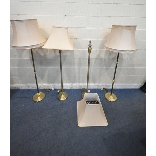 1355 - FOUR BRASS STANDARD LAMPS, all with shades (condition report: one lamp missing shade fitting) (4)