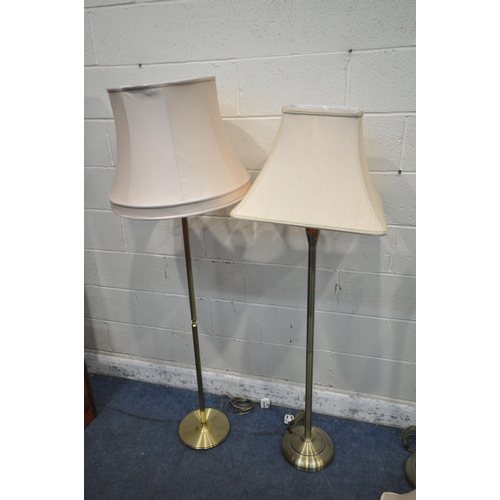 1355 - FOUR BRASS STANDARD LAMPS, all with shades (condition report: one lamp missing shade fitting) (4)