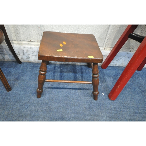 1357 - AN OVAL BEVELLED EDGE WALL MIRROR, 80cm x 52cm, a red and black painted stool, a small elm stool and... 