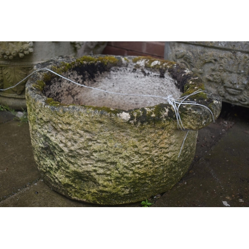 1009 - A WEATHERED COMPOSITE CIRCULAR PLANTER, with twin handles, diameter 51cm x height 29cm along with a ... 