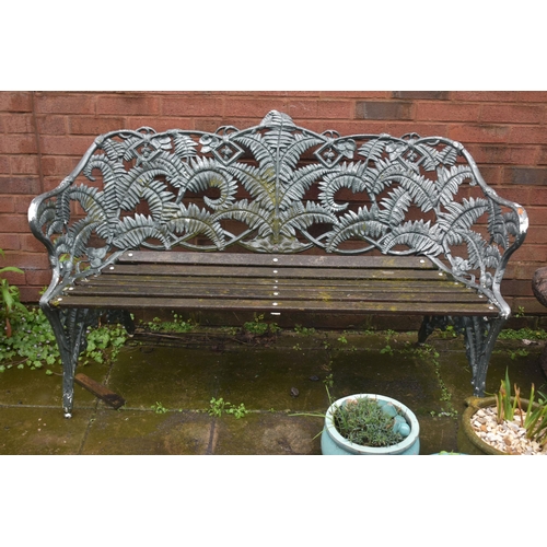 1012 - A COALBROOKDALE STYLE PAINTED CAST ALUMINIUM GARDEN BENCH, with fern leaf decoration, and teak slats... 