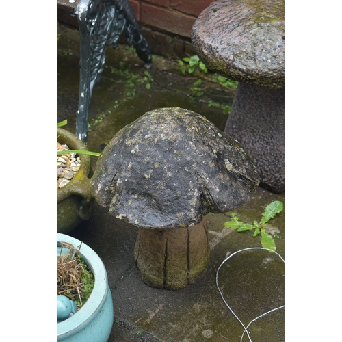 1013 - A SMALL MODERN COMPOSITE STADDLE STONE, diameter 38cm x height 46cm, along with weathered mushroom s... 