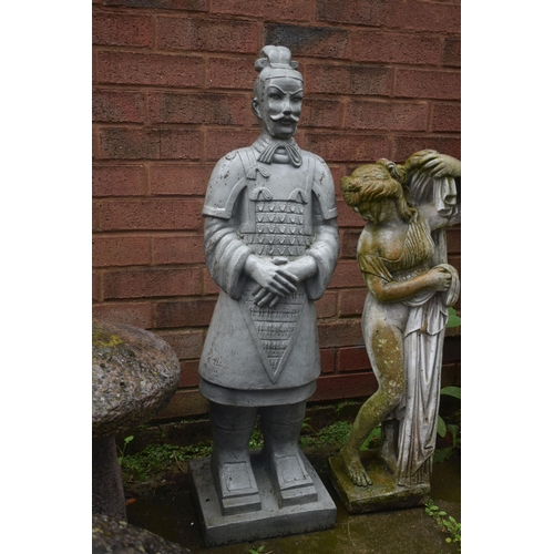 1014 - A WEATHERED COMPOSITE GARDEN FIGURE OF A SEMI CLAD LADY, height 75cm, along with a modern figure of ... 