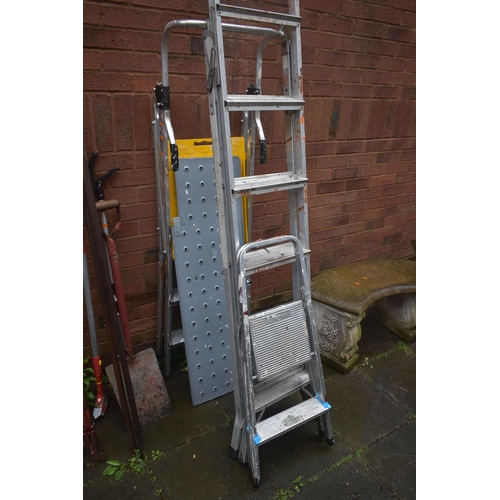 1028 - TWO ALUMINIUM STEP LADDERS, an aluminium decorators ladder, and a selection of garden hand tools (15... 