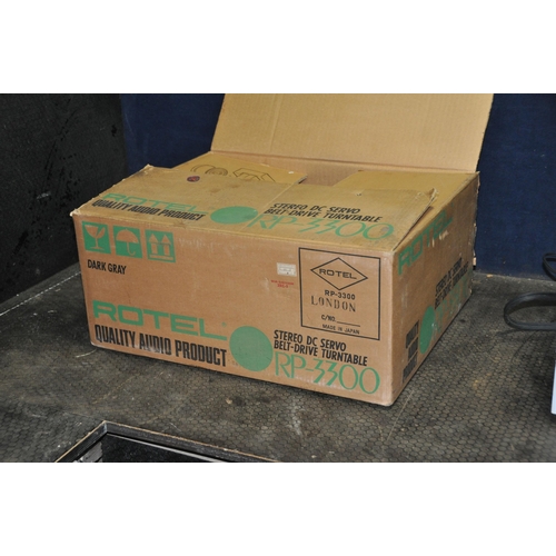 1088 - A ROTEL AND ACOUSTIC SOLUTIONS COMPONENT HI FI comprising of a RP-3300 in original packaging (needs ... 