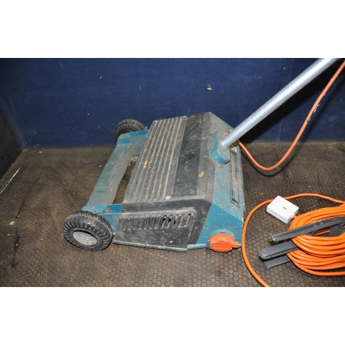 1090 - A BLACK AND DECKER STRIMMER, a Qualcast Strimmer (both PAT pass and working), two extension cables a... 