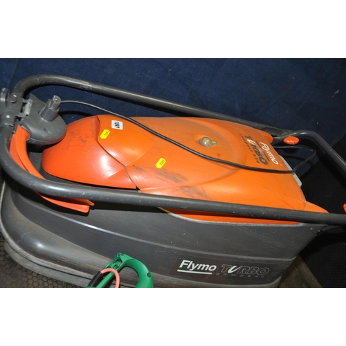 1097 - A FLYMO TURBO COMPACT 330 LAWN MOWER and a Qualcast Strimmer (both PAT pass and working)