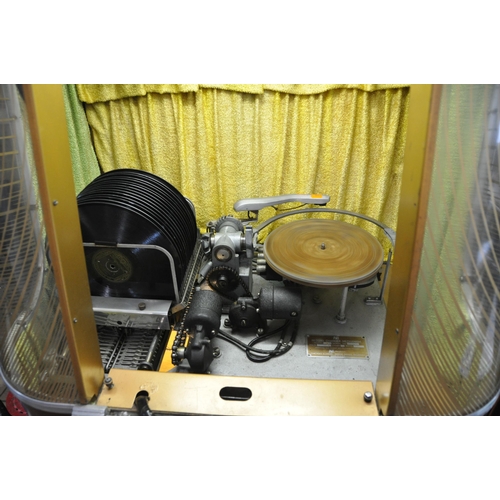 1106 - A LATE 1940s AMI INCORPORATED MODEL B JUKEBOX with a model 500 disc changer for 78s, 75w valve ampli... 