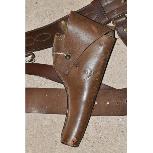 162 - A VINTAGE BROWN LEATHER PISTOL HOLSTER AND A BROWN LEATHER BELT (2)