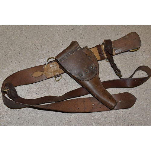 162 - A VINTAGE BROWN LEATHER PISTOL HOLSTER AND A BROWN LEATHER BELT (2)