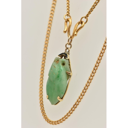 12 - A JADE PENDANT AND CHAIN, the pendant designed as a carved jade fruit in a claw mount, suspended fro... 