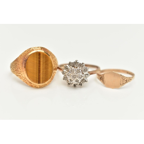 14 - THREE 9CT GOLD RINGS, to include a textured signet ring set with an oval tiger's eye panel, a furthe... 