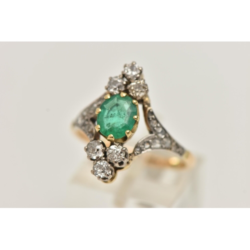 25 - AN 18CT GOLD EMERALD AND DIAMOND DRESS RING, centrally set with an oval cut emerald in an eight claw... 