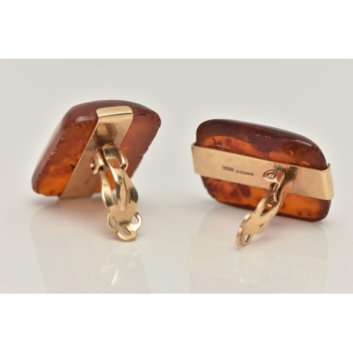 27 - A PAIR OF 9CT GOLD AMBER EARRINGS, rectangular form cabochon earrings, fitted with yellow gold clip ... 