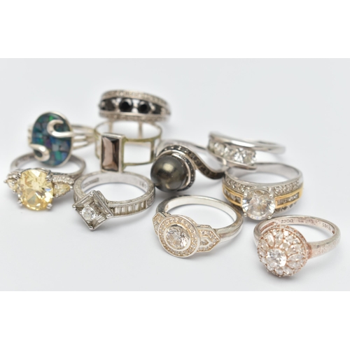 32 - TEN WHITE METAL RINGS, to include a rectangular smoky quartz ring, an imitation pearl ring, various ... 