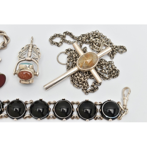 34 - FOUR ITEMS OF SILVER AND WHITE METAL JEWELLERY, to include a cross pendant set to the centre with an... 