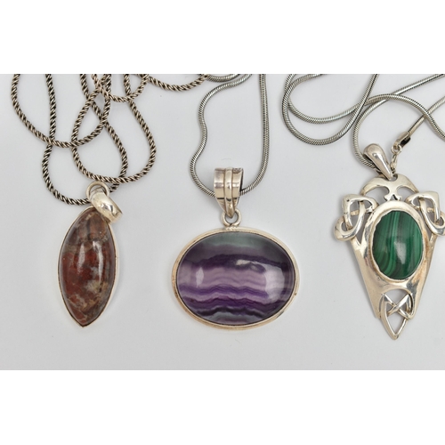 35 - FOUR GEM SET PENDANT NECKLACES, to include malachite, rutilated quartz, banded fluorite and jasper, ... 