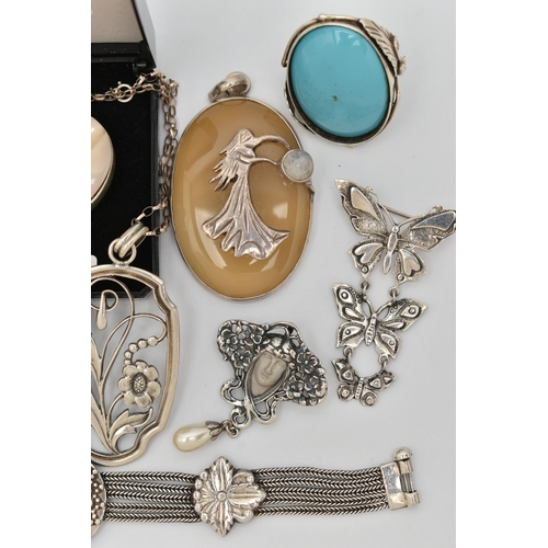 42 - AN ASSORTMENT OF WHITE METAL JEWELLERY, to include a white metal and lapis lazuli floral bracelet, t... 