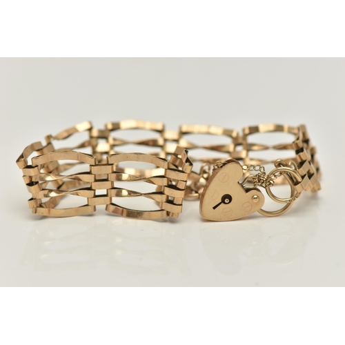 54 - A 9CT GOLD GATE BRACELET, four bar bracelet, fitted with a heart padlock clasp, hallmarked 9ct Londo... 