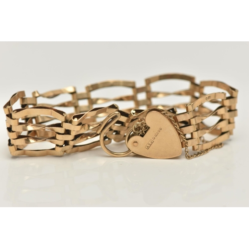 54 - A 9CT GOLD GATE BRACELET, four bar bracelet, fitted with a heart padlock clasp, hallmarked 9ct Londo... 