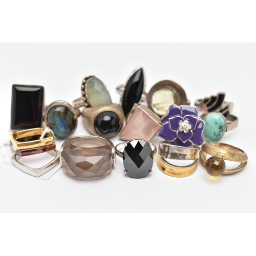 59 - AN ASSORTMENT OF SILVER AND WHITE METAL RINGS, to include six large silver statement rings, five gem... 