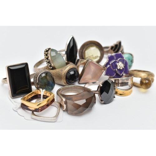 59 - AN ASSORTMENT OF SILVER AND WHITE METAL RINGS, to include six large silver statement rings, five gem... 