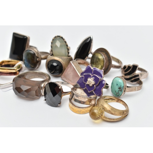 59 - AN ASSORTMENT OF SILVER AND WHITE METAL RINGS, to include six large silver statement rings, five gem... 