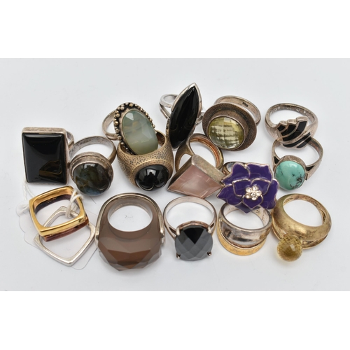 59 - AN ASSORTMENT OF SILVER AND WHITE METAL RINGS, to include six large silver statement rings, five gem... 