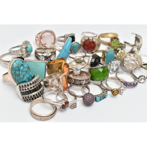 61 - AN ASSORTMENT OF SILVER AND WHITE METAL RINGS, to include nine large silver statement rings, all gem... 