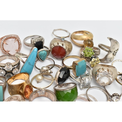 61 - AN ASSORTMENT OF SILVER AND WHITE METAL RINGS, to include nine large silver statement rings, all gem... 