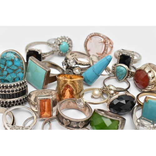 61 - AN ASSORTMENT OF SILVER AND WHITE METAL RINGS, to include nine large silver statement rings, all gem... 