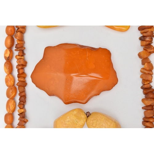 68 - AN ASSORTMENT OF AMBER AND COMPOSITE AMBER, to include a natural amber graduated beaded necklace, co... 