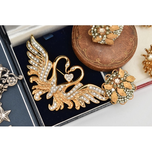 70 - AN ASSORTMENT OF COSTUME JEWELLERY, to include a white metal 'Askew London' celestial brooch, a doub... 